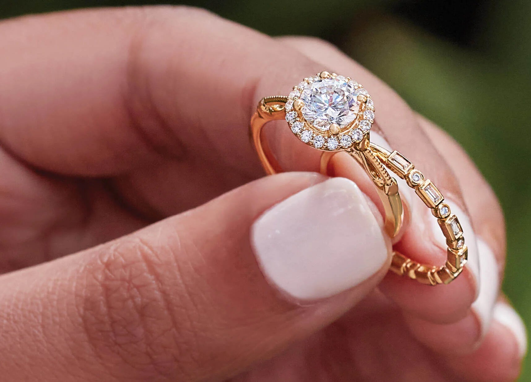 Expert jewelry design team in Newton working on a custom engagement ring from initial pencil sketch to final polish.