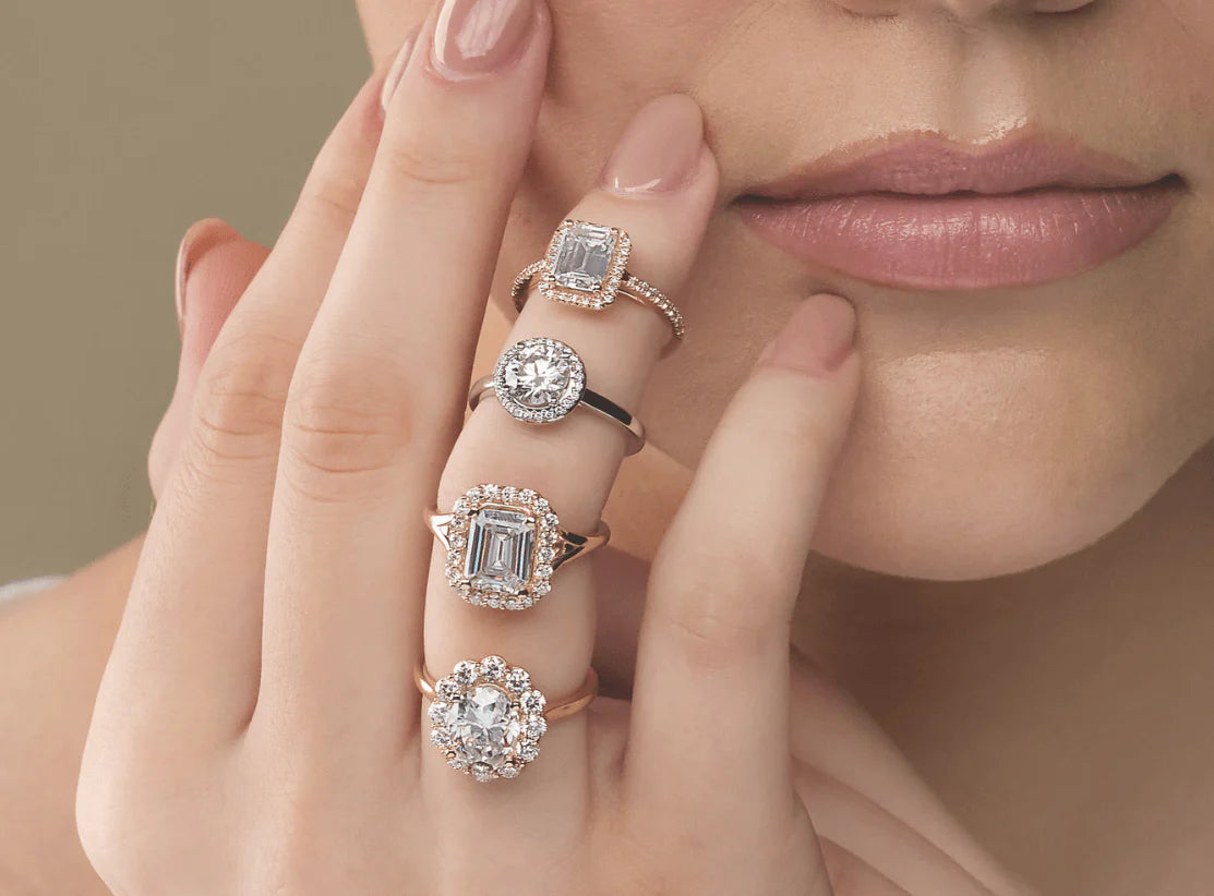 Tailored halo engagement ring design featuring a vintage aesthetic and bold double-halo for maximum brilliance.