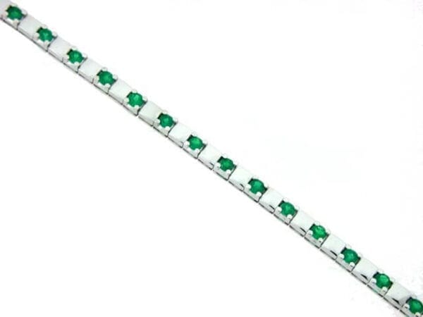 18kt white gold colombian emerald tennis bracelet